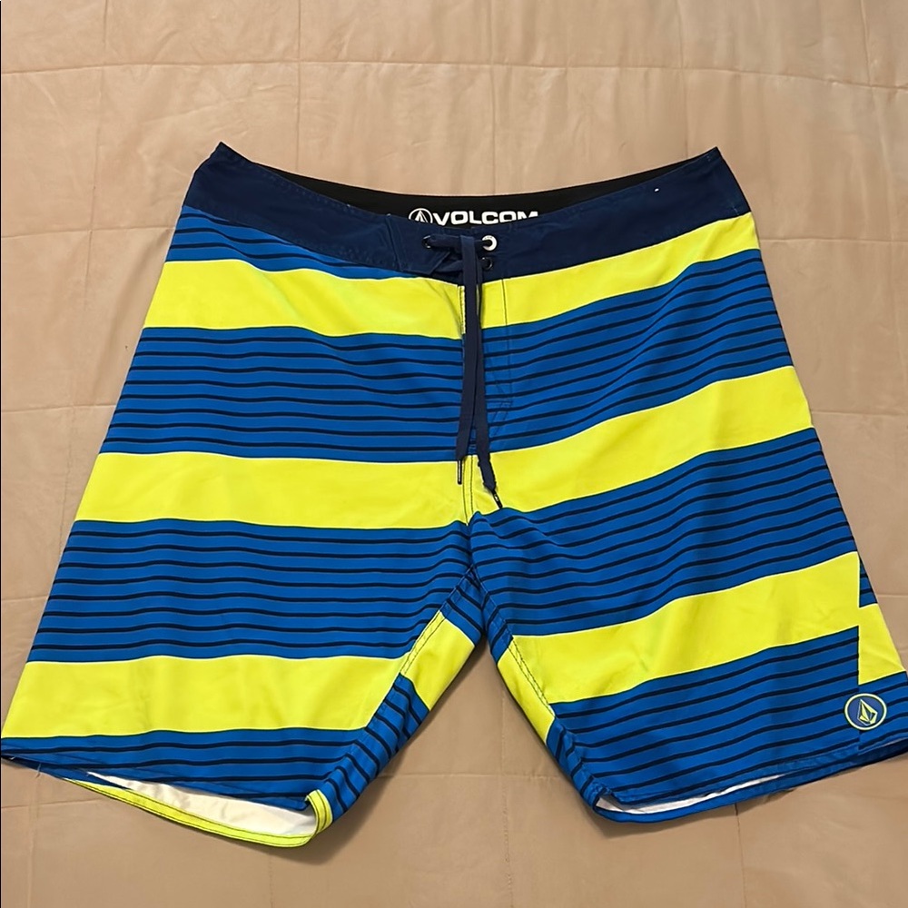 Volcom Blue and Yellow Board Shorts with Bold Stripes